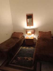 Istumisnurk majutusasutuses حنضلةHandala Guest House