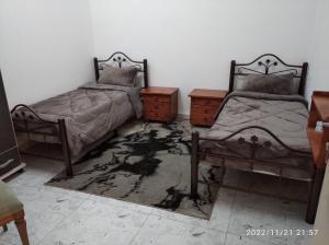 Voodi või voodid majutusasutuse حنضلةHandala Guest House toas
