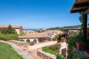 a view of a city from a house at Porto Cervo Centro con piscina, Le Terrazze del Porto in Porto Cervo