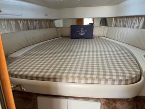 a bed in the back of a boat at MareLuna in Menton