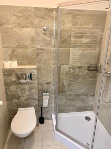 Łazienka w obiekcie Apartamenty i Studia HERBARIUM