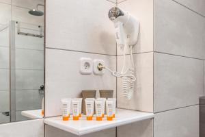 Koupelna v ubytování Aqua Viva Darłowo Apartment by Noclegi Renters + 12 fotografií
