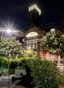 a building with a clock on it at night at Tower Bridge! Immaculate One Bed in London