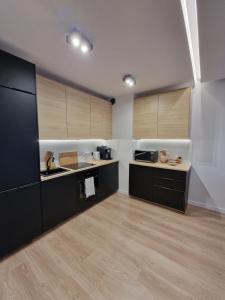 Kuchyňa alebo kuchynka v ubytovaní Apartament nad Iławką