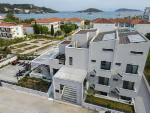 an aerial view of a white apartment building at Niso Skiathos in Skiathos