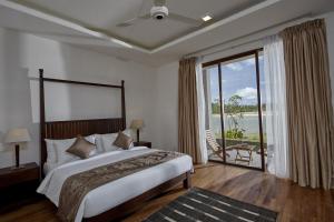 Letto o letti in una camera di Amaranthe Bay Resort & Spa