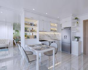 een witte keuken met een witte tafel en stoelen bij Lu Luxury Homestay et Apartment - Vinhomes Smart City Hanoi in Hanoi