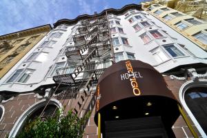 a hotel sign in front of a tall building at Hotel Julian in San Francisco