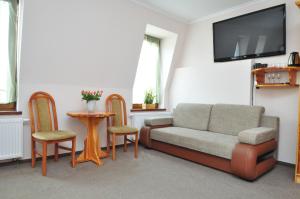 Гостиная зона в Aparthotel Mikołajki