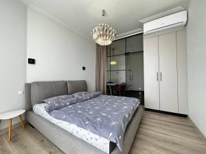 Posteľ alebo postele v izbe v ubytovaní Sea Symphony 3-bedrooms Lux Apartment