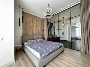 Posteľ alebo postele v izbe v ubytovaní Sea Symphony 3-bedrooms Lux Apartment