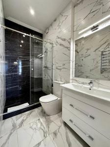 Kúpeľňa v ubytovaní Sea Symphony 3-bedrooms Lux Apartment + 10 fotografií
