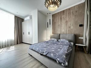 Posteľ alebo postele v izbe v ubytovaní Sea Symphony 3-bedrooms Lux Apartment
