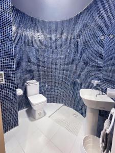 Vannituba majutusasutuses HOSTAL MH BORJ