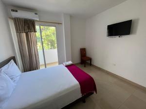 TV a/nebo společenská místnost v ubytování Mare S&M Casa Hostal
