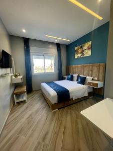 Voodi või voodid majutusasutuse HOSTAL MH BORJ toas