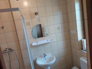 Kúpeľňa v ubytovaní Pokoje Goscinne TOMASZ
