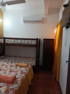 Postel nebo postele na pokoji v ubytování Apartamentos Victoria