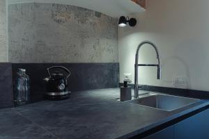 Η κουζίνα ή μικρή κουζίνα στο 15th Century Loft - Verona City Centre