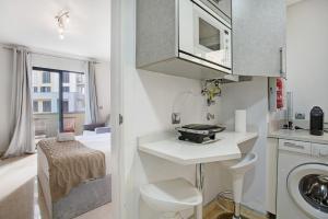 Η κουζίνα ή μικρή κουζίνα στο Apartamento Forum View Studio