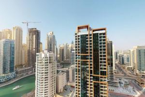 a view of a city skyline with tall buildings at Key View - Emaar Residences, Marina Mall in Dubai