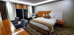 Postel nebo postele na pokoji v ubytování Bulvar Hotel + 28 fotografií