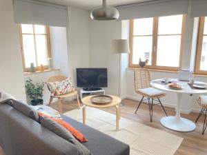 Telewizja i/lub zestaw kina domowego w obiekcie Gîte des Victoires