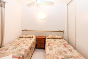 Posteľ alebo postele v izbe v ubytovaní Apartment Bond