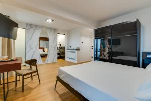 Kuchyň nebo kuchyňský kout v ubytování RoccaRegina Hotel