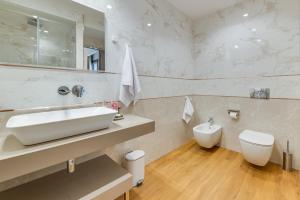 Koupelna v ubytování RoccaRegina Hotel