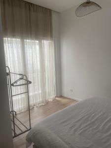 Ein Bett oder Betten in einem Zimmer der Unterkunft Bel appartement au cœur de Marseille