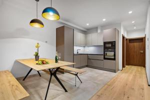 Kuchyň nebo kuchyňský kout v ubytování Apartmány Čistá