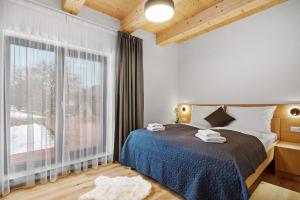 Postel nebo postele na pokoji v ubytování Apartmány Čistá