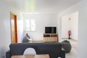 TV a/nebo společenská místnost v ubytování Casa Vilar
