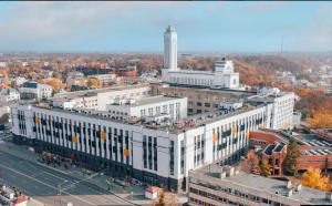an aerial view of a large white building in a city at Cozy Loft in Kaunas