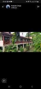 a picture of a bridge over a river at Maylyn Guesthouse in Vang Vieng
