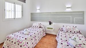 Posteľ alebo postele v izbe v ubytovaní Villa Yuca Conil de la Frontera by Ruralidays
