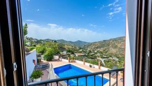 desde el balcón de una villa con piscina en Villa La Posada Canillas de Albaida by Ruralidays, en Canillas de Albaida