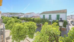 a view of a street with trees and a building at Casa Leal La Puebla de Los Infantes by Ruralidays in La Puebla de los Infantes