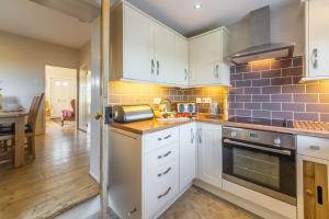 Köök või kööginurk majutusasutuses 4 Harbour View