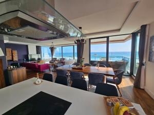 a living room with a view of the ocean at Arnelya Beach Penthouse 285m2 in Alanya