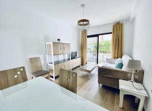 Postel nebo postele na pokoji v ubytování Apartamentos Turísticos Santo Rostro