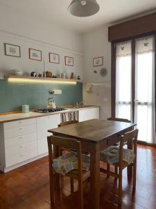 Кухня или мини-кухня в Appartamento Ferrara

