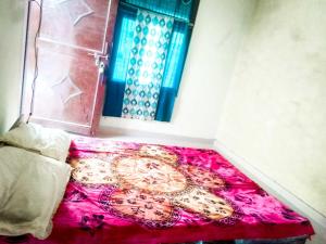 Katil atau katil-katil dalam bilik di OYO Home Akhil Oyo Rooms