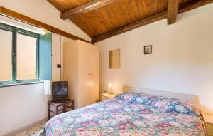Letto o letti in una camera di Magia dell'Aspromonte