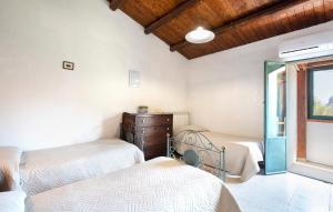 Letto o letti in una camera di Magia dell'Aspromonte