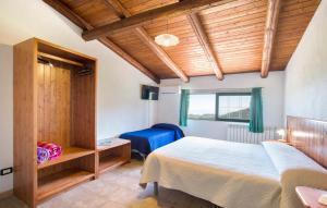 Letto o letti in una camera di Magia dell'Aspromonte