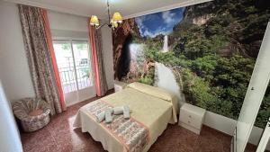 Postel nebo postele na pokoji v ubytování Vivienda rural Saltos de la Osera + 31 fotografií