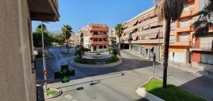 a view of a street in a city with buildings at Motril centro. in Motril