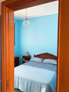 เตียงในห้องที่ GC Petit Palais Lampedusa